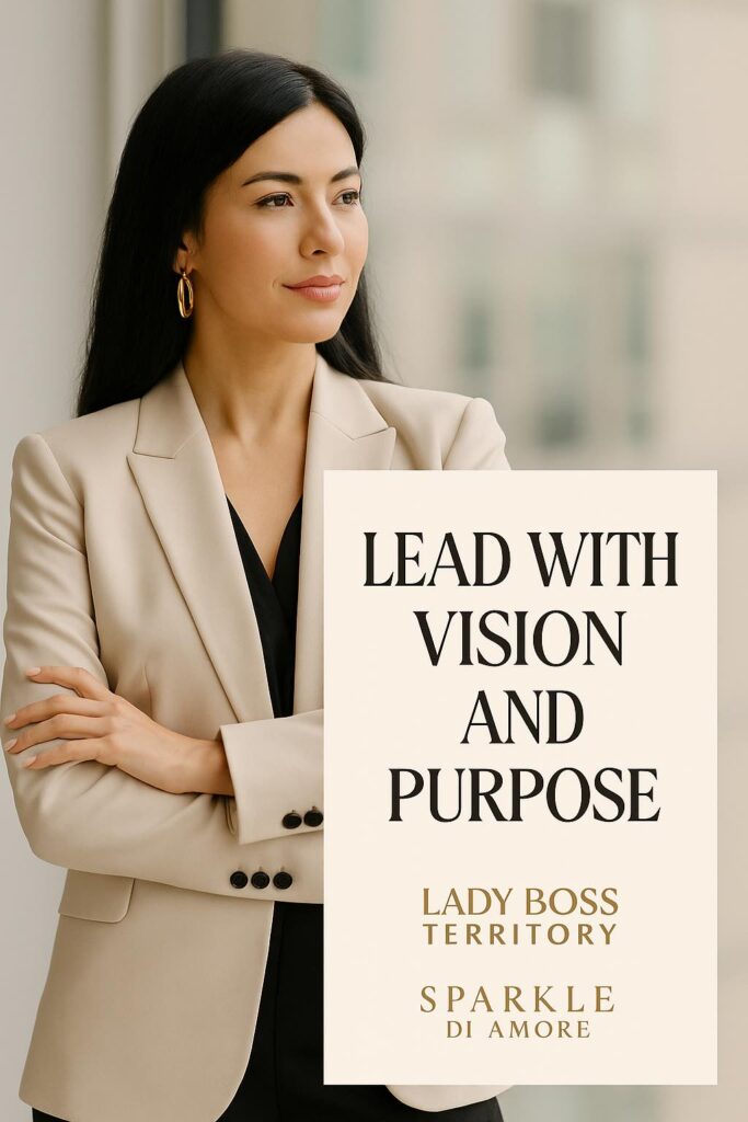 Professional woman in a beige blazer standing by a window, symbolizing leadership with vision and purpose in business.