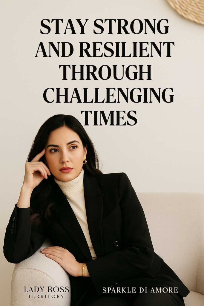 Professional woman in a black blazer sitting thoughtfully, symbolizing resilience and strength during business challenges.
